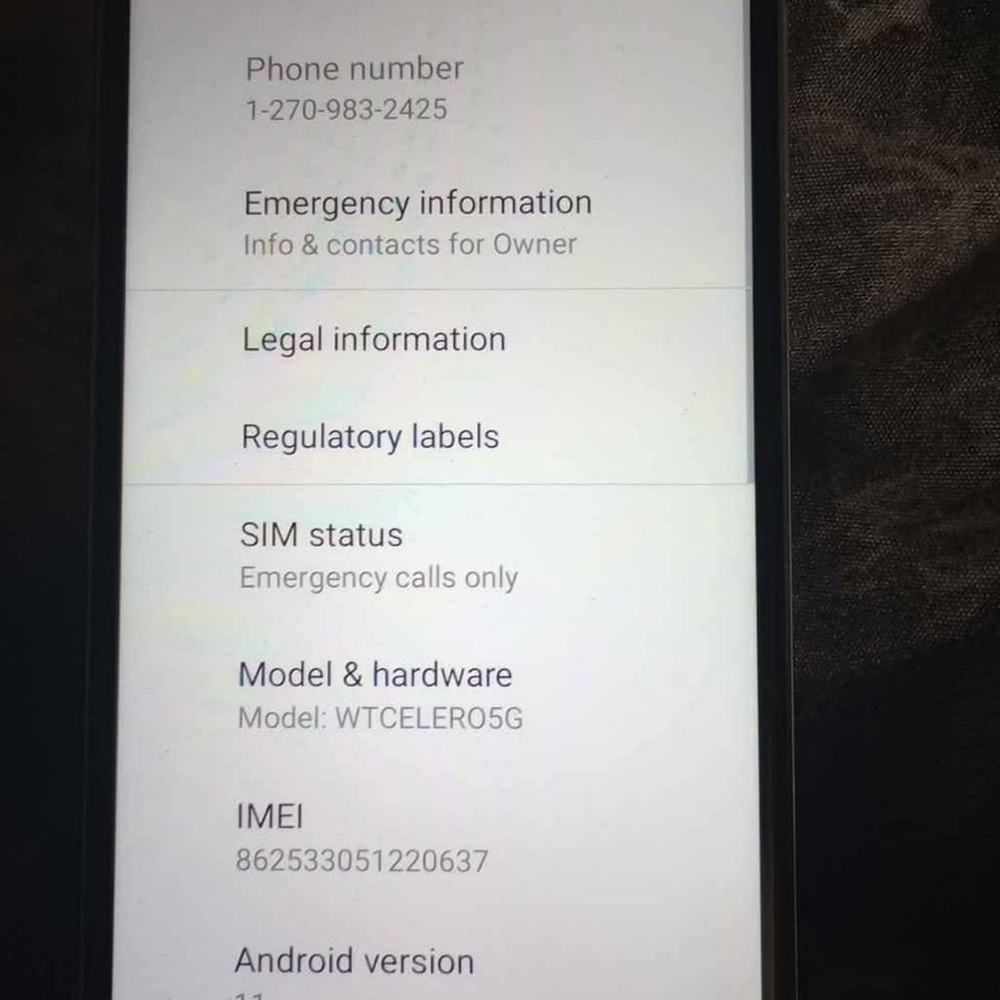 SOLD Black Smartphone with White Screen